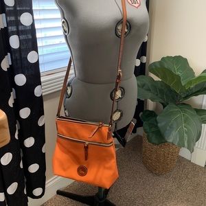 Dooney & Bourke Nylon orange crossbody.